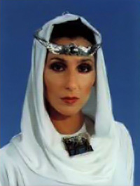 Cher wearing Winged Sun Circlet & Apis Cher